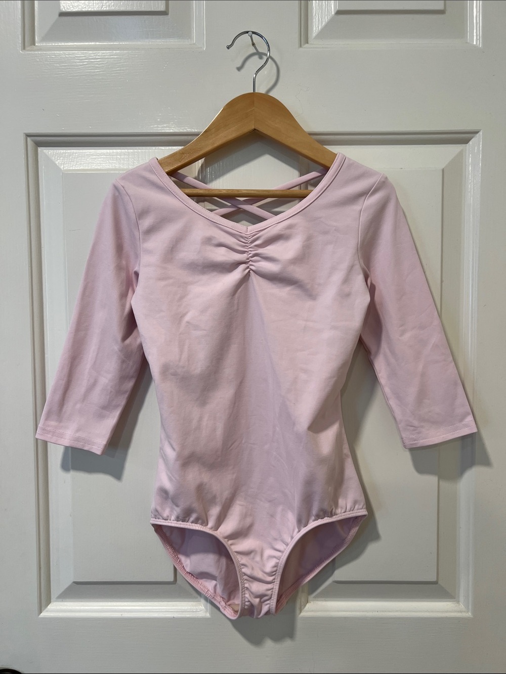 Danskin Now Light Pink Long Sleeve Dance Leotard with Crisscross Back Straps